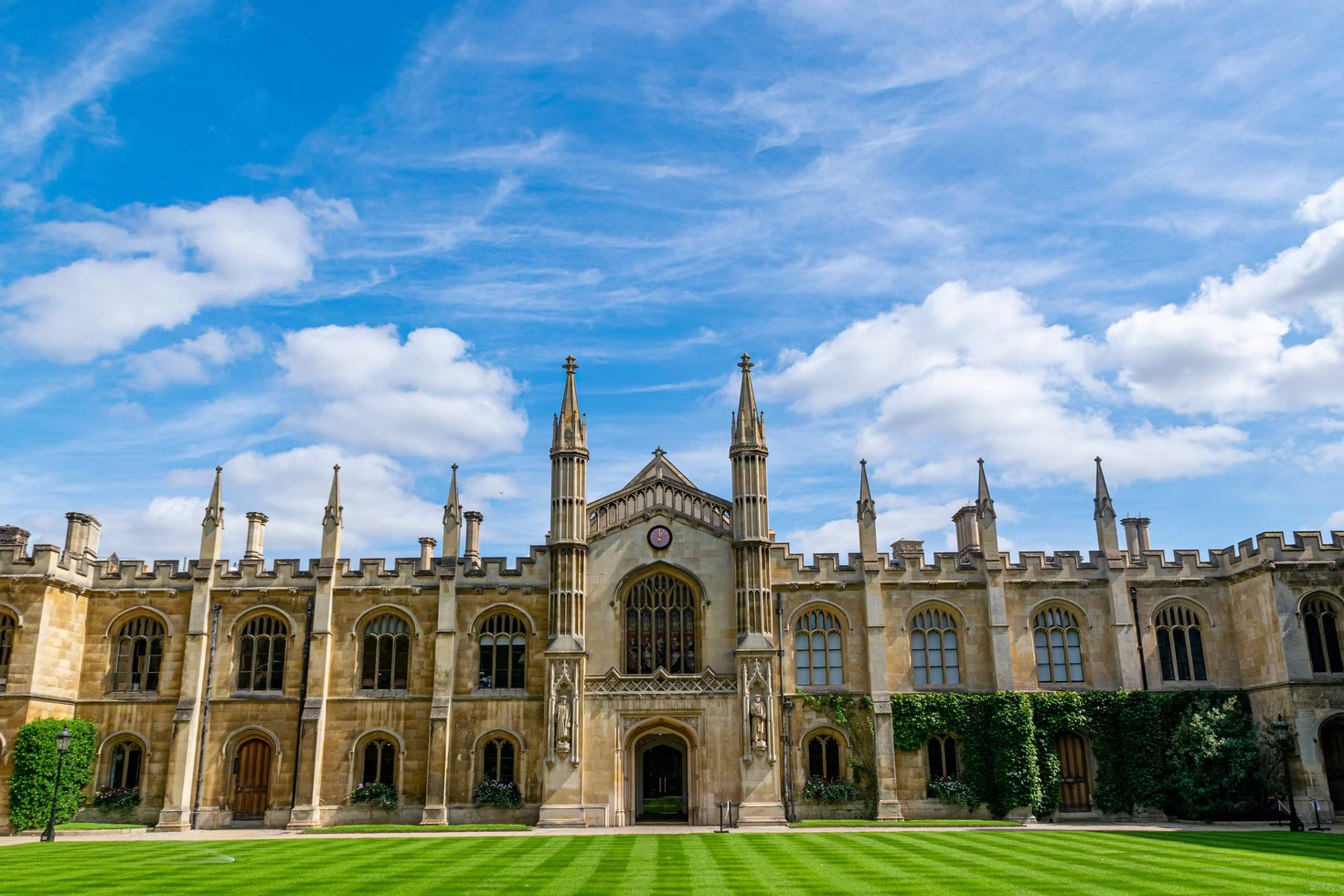 A view of a lawn in front a university