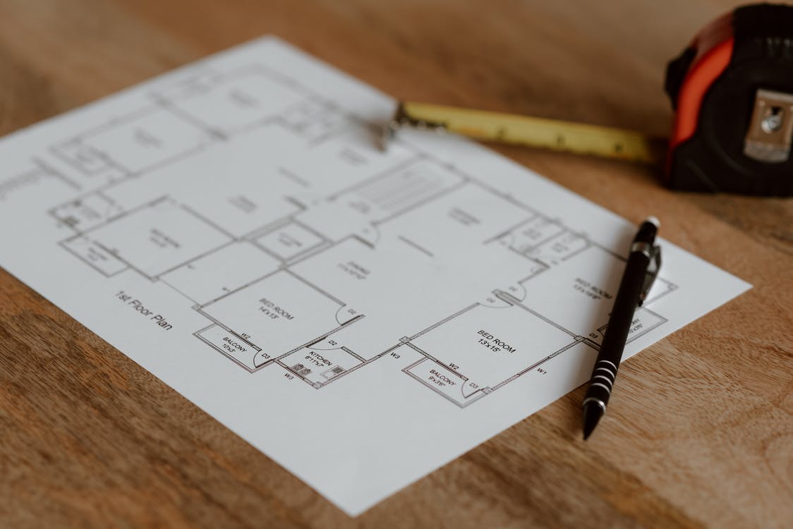 A design for proving water heating to a building